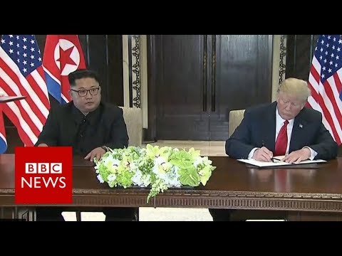 金川會世紀之握，兩方簽署歷史性文件